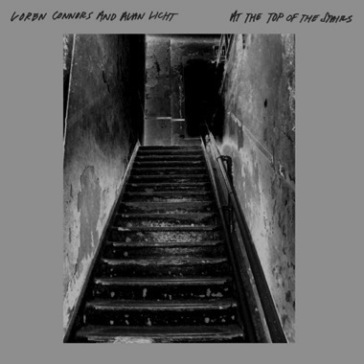 At the top of the stairs