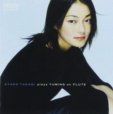 Plays yuming on flute
